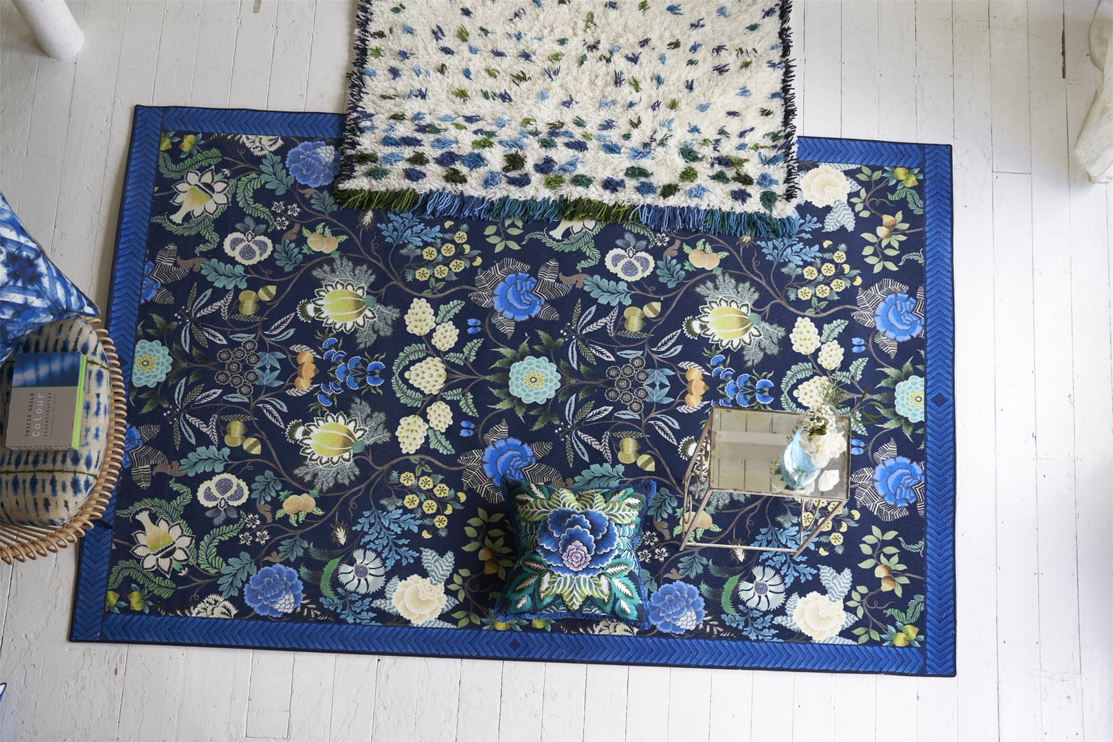 Floral rug styled in an elegant interior with botanical pattern and colour