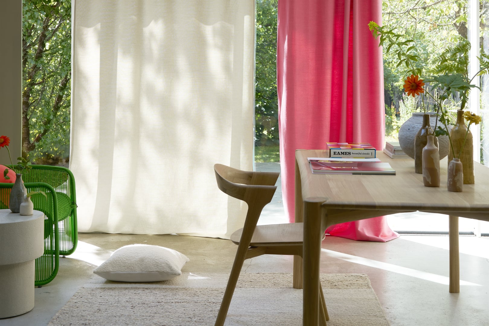 Brera Lino curtains framing large windows in a light-filled room