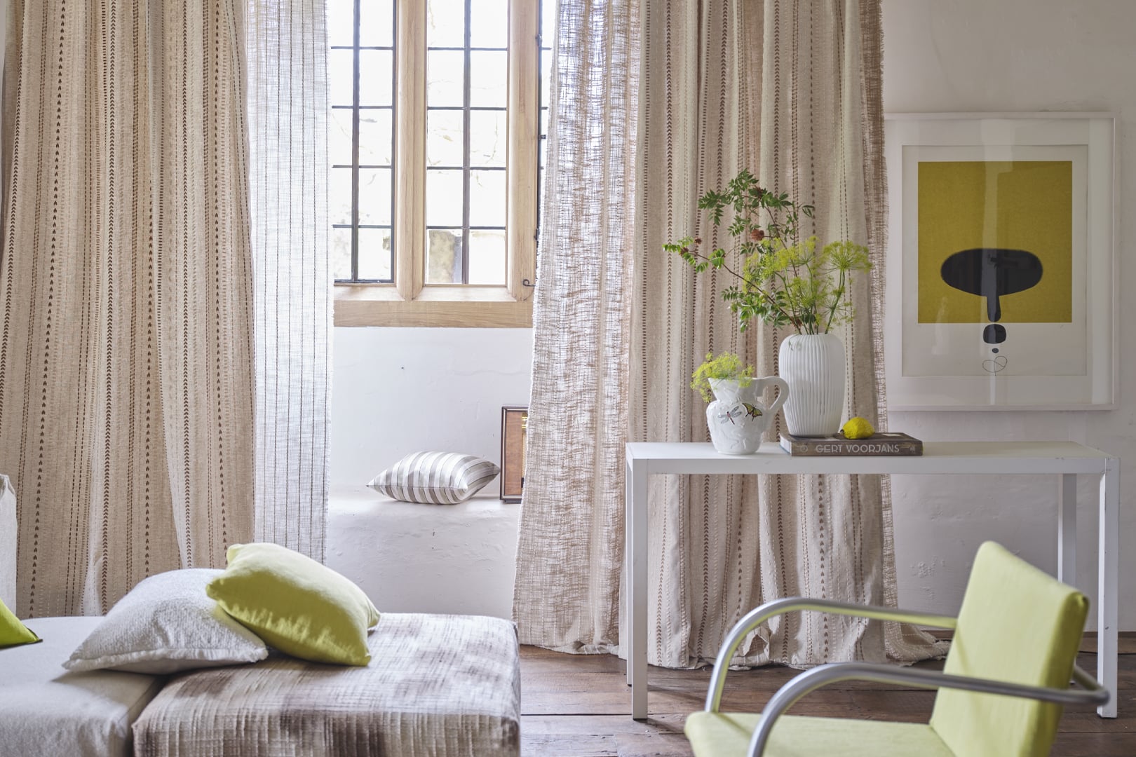 Panier Tressé Linen curtains in a softly lit room with textured natural fabric and calm neutral tones