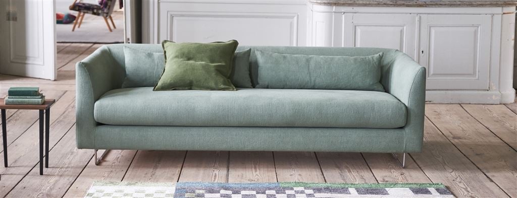 Sleek Sofa With Bolster Cushions