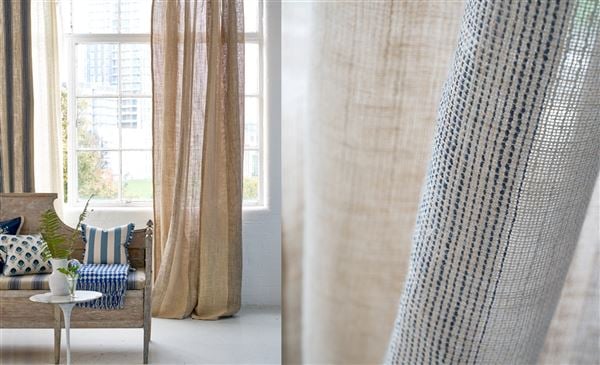 Elegant Designers Guild curtains and blinds in a l