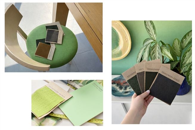 Hand holding fabric and wallpaper samples in a hom